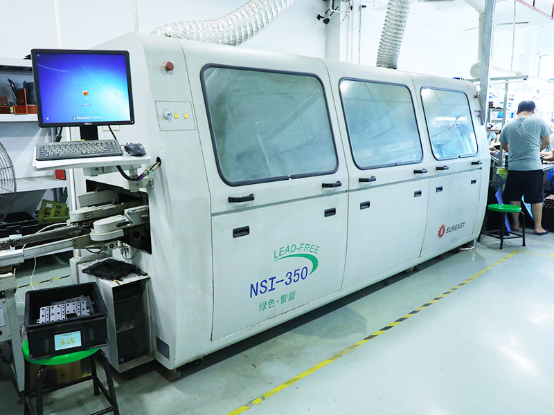 Double wave solder machines